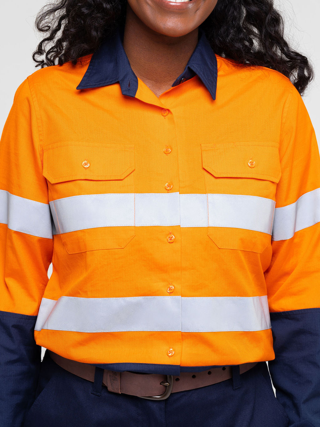 Ladies hi‑vis lightweight ripstop cotton shirt in orange/navy with reflective tape; underarm/back ventilation; extended sun‑protection collar; nine‑button design