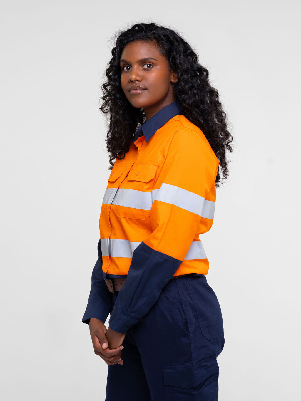 Ladies hi‑vis lightweight ripstop cotton shirt in orange/navy with reflective tape; underarm/back ventilation; extended sun‑protection collar; nine‑button design