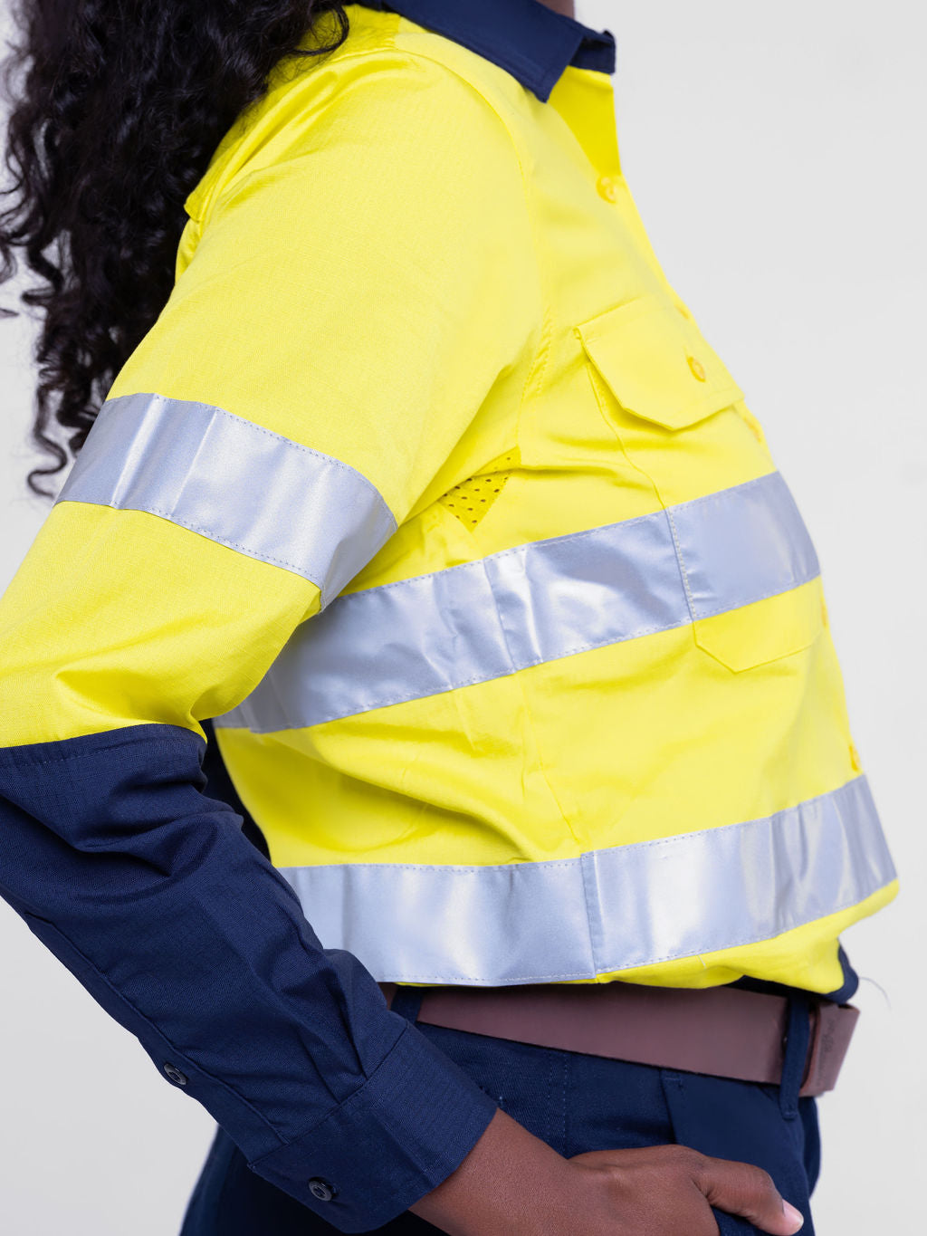 Ladies hi‑vis lightweight 150 gsm ripstop cotton shirt in yellow/navy; reflective tape; vented underarms/back; modern tapered fit; extended sun‑protection collar