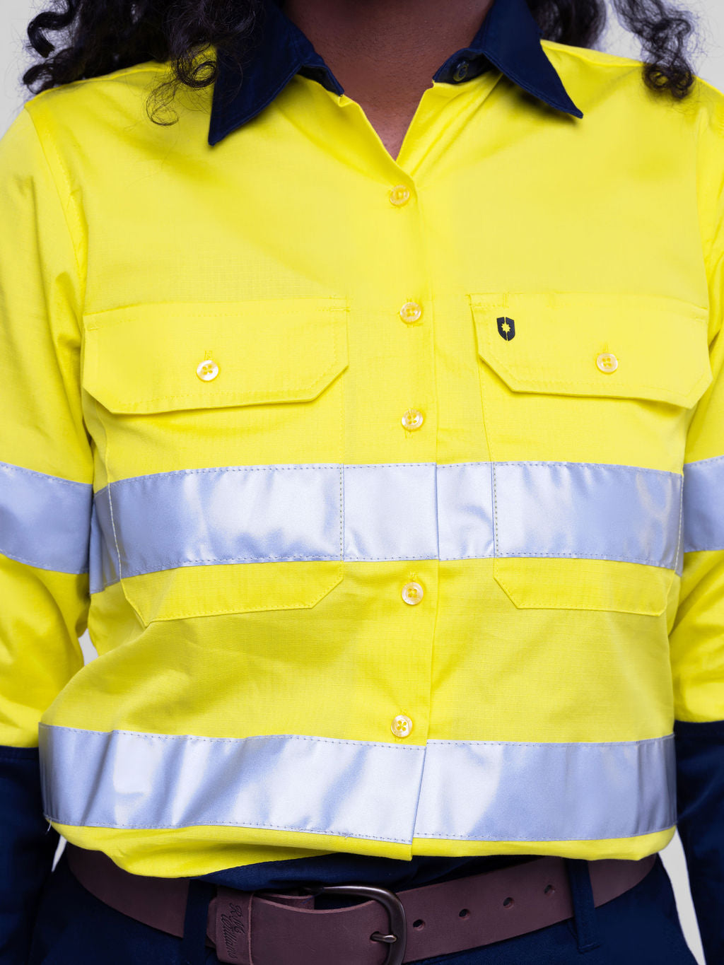 Ladies hi‑vis lightweight 150 gsm ripstop cotton shirt in yellow/navy; reflective tape; vented underarms/back; modern tapered fit; extended sun‑protection collar