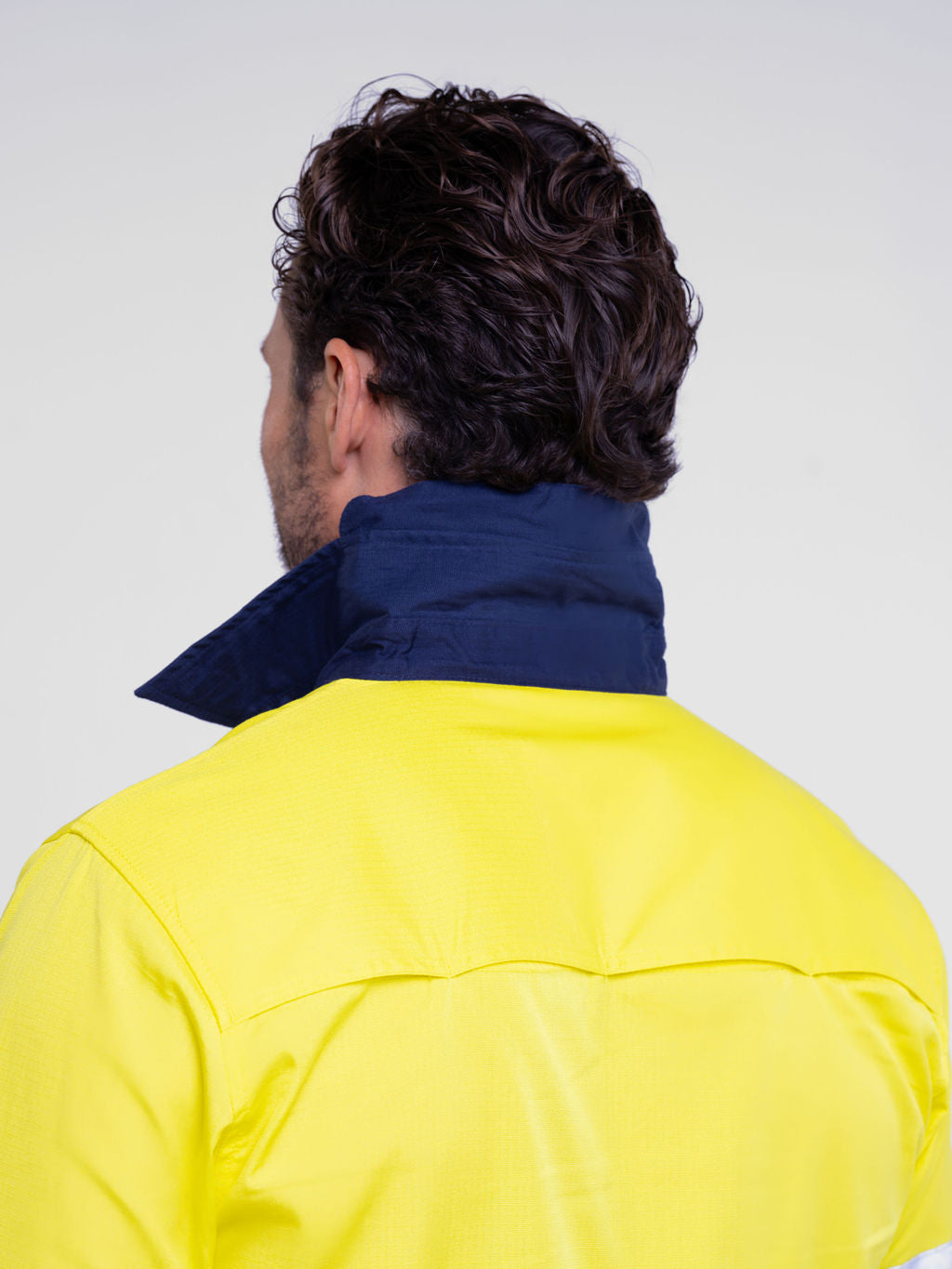 Men’s hi‑vis lightweight ripstop cotton shirt in yellow/navy with reflective tape, underarm/back vents, extended sun‑protection collar and modern tapered fit