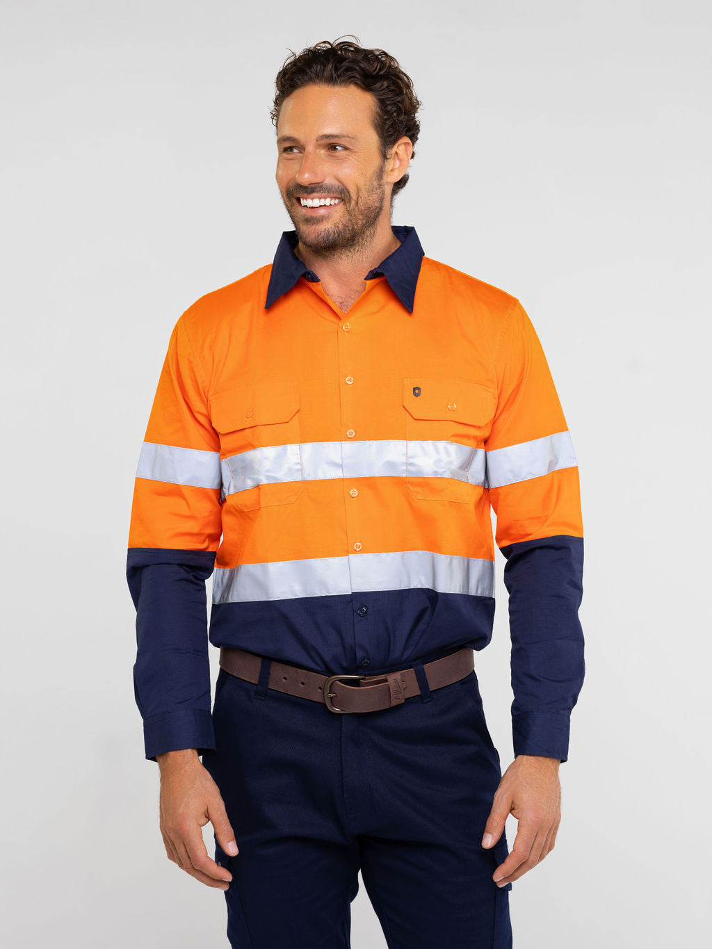 Men’s hi‑vis regular‑weight 190 gsm cotton drill long‑sleeve shirt in orange/navy with reflective tape, extended sun‑protection collar and modern tapered fit for day/night use
