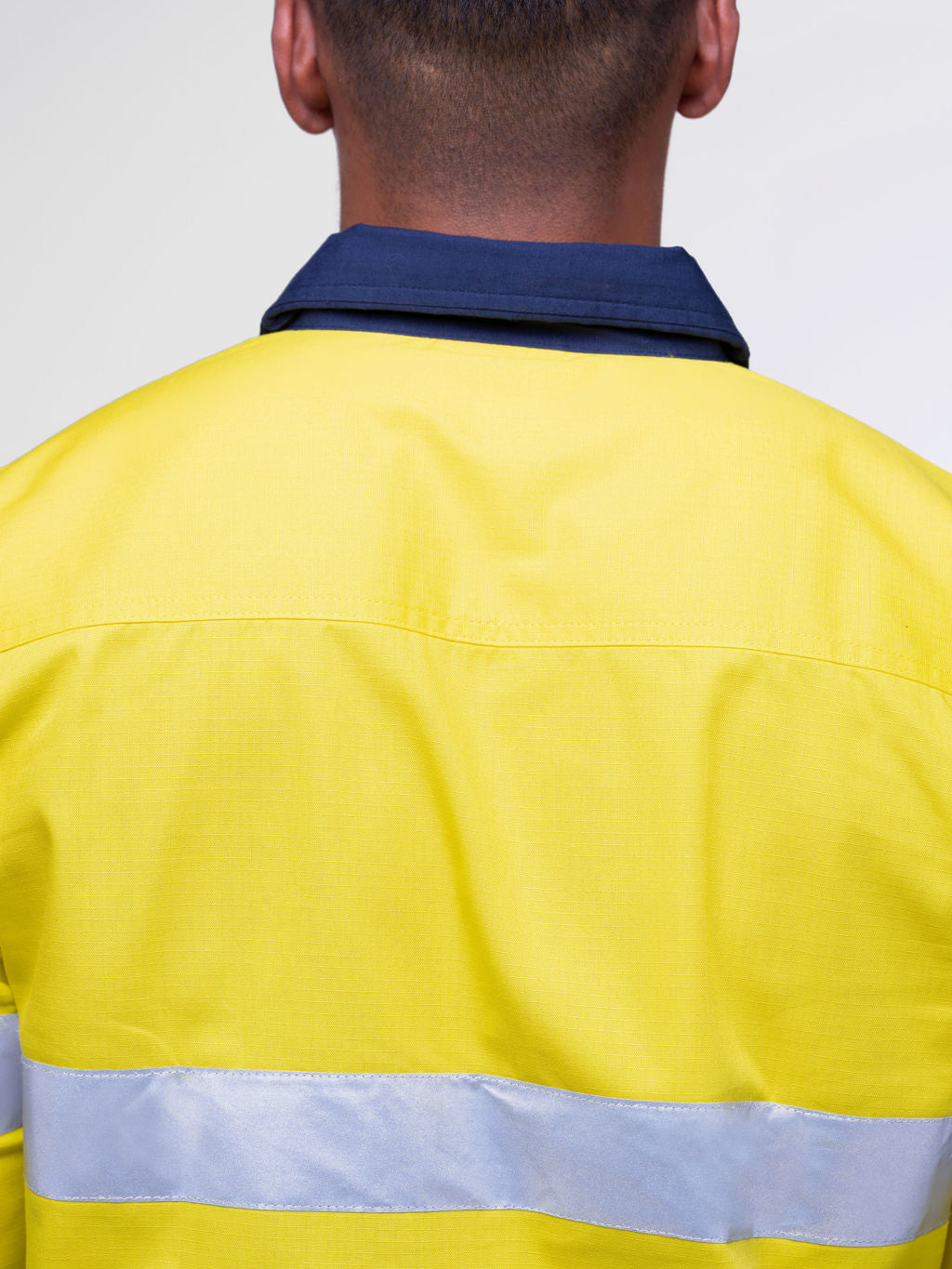 Men’s hi‑vis regular‑weight 190 gsm cotton drill long‑sleeve shirt in yellow/navy with reflective tape, extended sun‑protection collar and modern tapered fit for day/night use