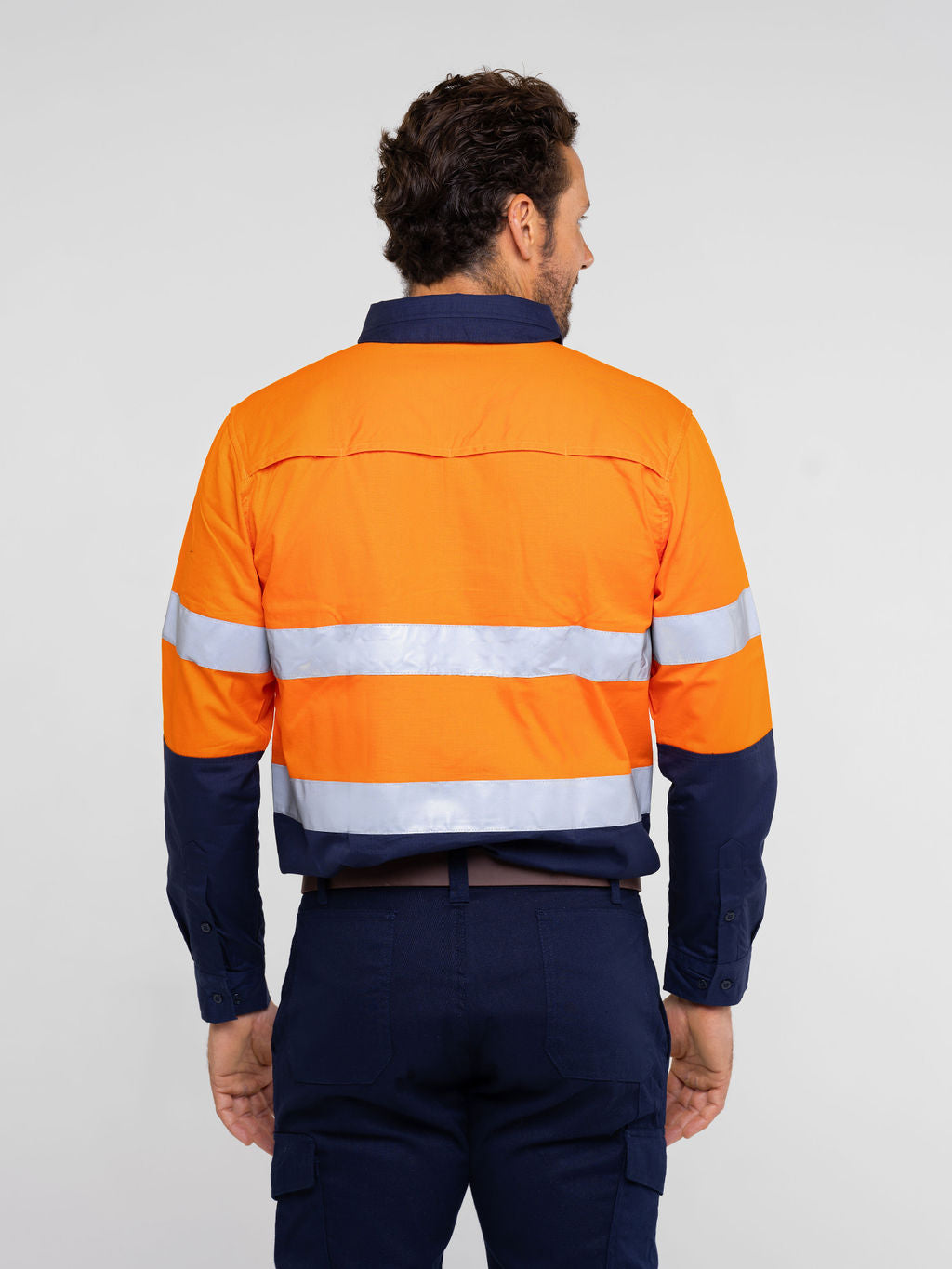 Men’s hi‑vis lightweight 150 gsm ripstop cotton shirt in orange/navy with 50 mm reflective tape, vented underarms/back, extended sun‑protection collar and modern fit
